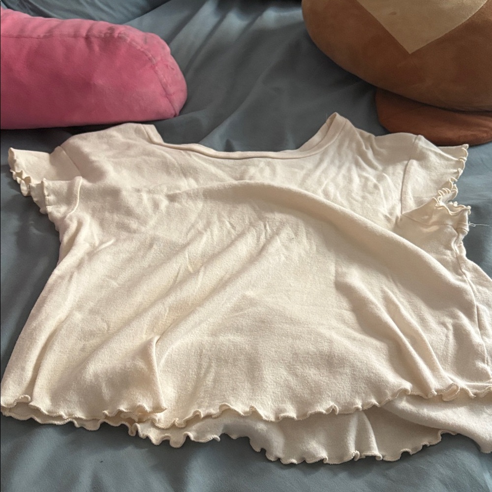 Brandy Melville creamy yellow ruffle top